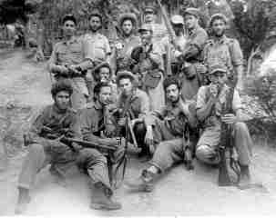 Integrantes de la columna 11. Agachado con sombrero Pedro Ballester, uno de los prisioneros asesinados en La Caobita